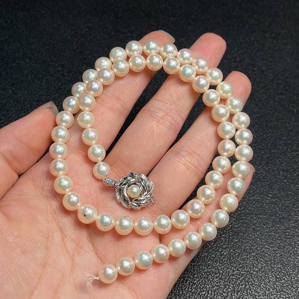 HUILIU HQ seawater pearl necklace with 6.8mm pearls, non-gold, weighing about 29.84g, showcasing a string of lustrous pearls.