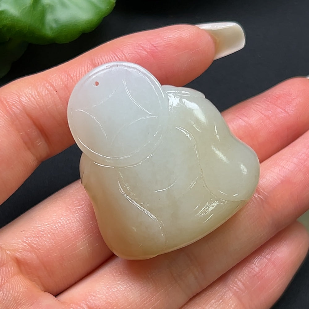 Hong Kong HKHQ Hetian Jade Buddha pendant necklace with detailed carved jade charm on a delicate chain.