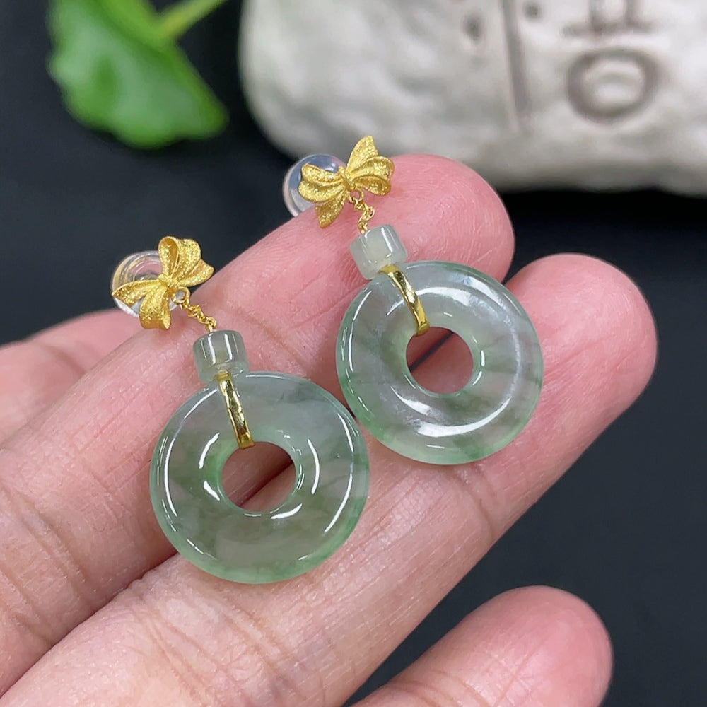 HUILIU HQ Jadeite donut stud earrings with 18k gold settings on white background, showcasing the round green jade jewelry.