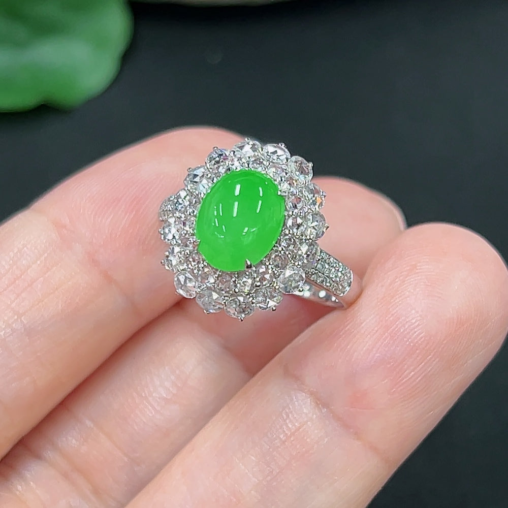 Jadeite ring with diamond accents in 18K gold, size 14, featuring a polished jade gemstone and delicate diamond details.