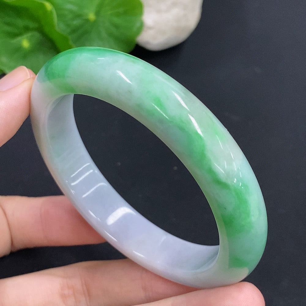 HKHQ jadeite round bangle bracelet, 60.6g weight, size 57.3, smooth polished surface and vibrant green color.