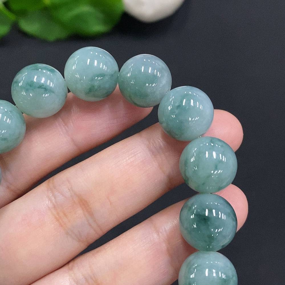 Huiliu Jadeite bead necklace with 12.4mm round jade beads, certified jade jewelry featuring smooth, polished green jade stones.