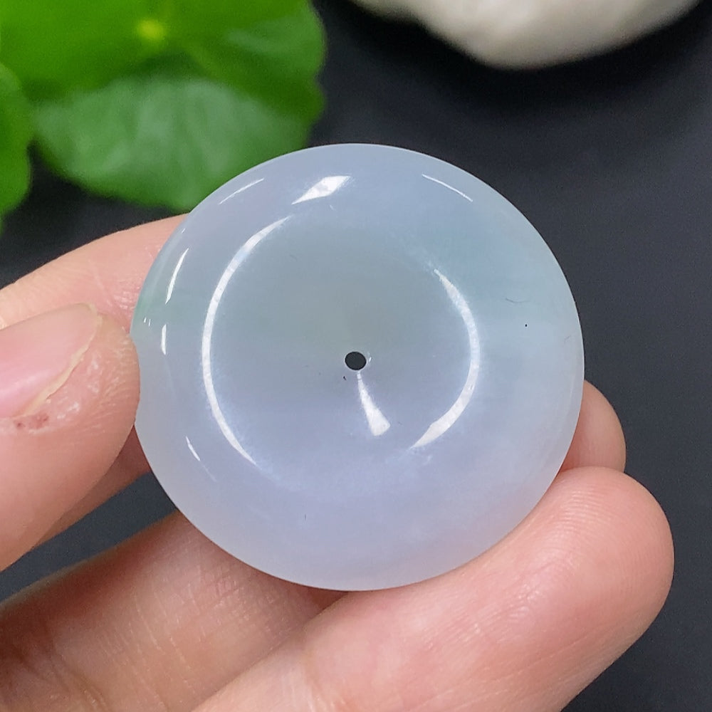Huiliu Jadeite Peace Knot pendant, certified jade jewelry with intricate knot design, showcasing smooth green jade surface.