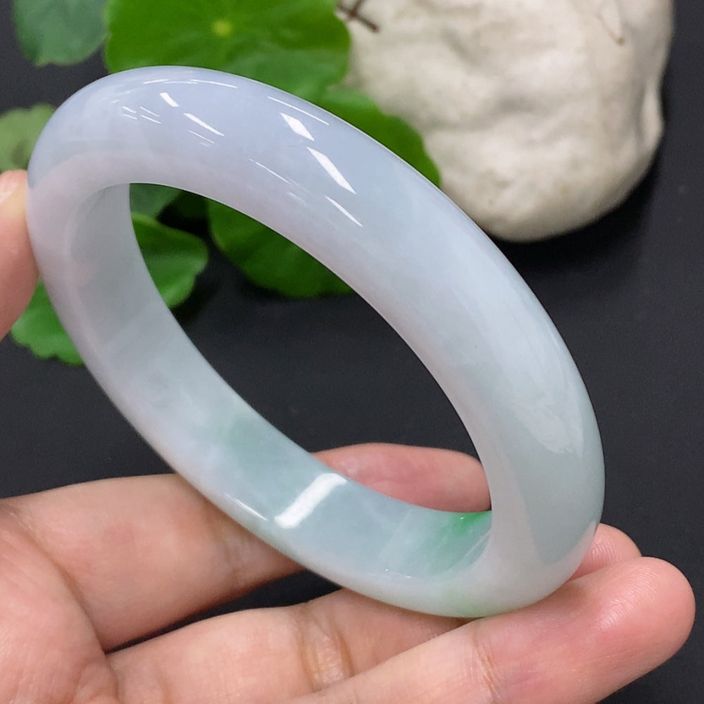 HKHQ jadeite round bangle, size 58.8, crafted from high-quality jade, weighing approximately 68.6g, showcasing smooth, polished surface.