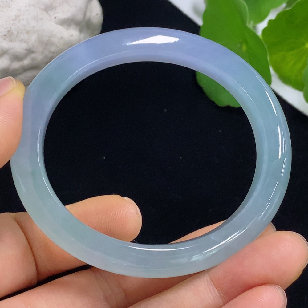 HKHQ jadeite oval bangle in size 53.2, weighing 38.2g, showcasing smooth, polished jadeite with a classic oval shape.