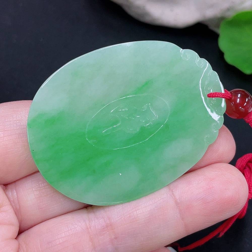 Jadeite tiger on mountain pendant from HUILIU HQ, showcasing a detailed carved jade jewelry piece with a mountain scene.