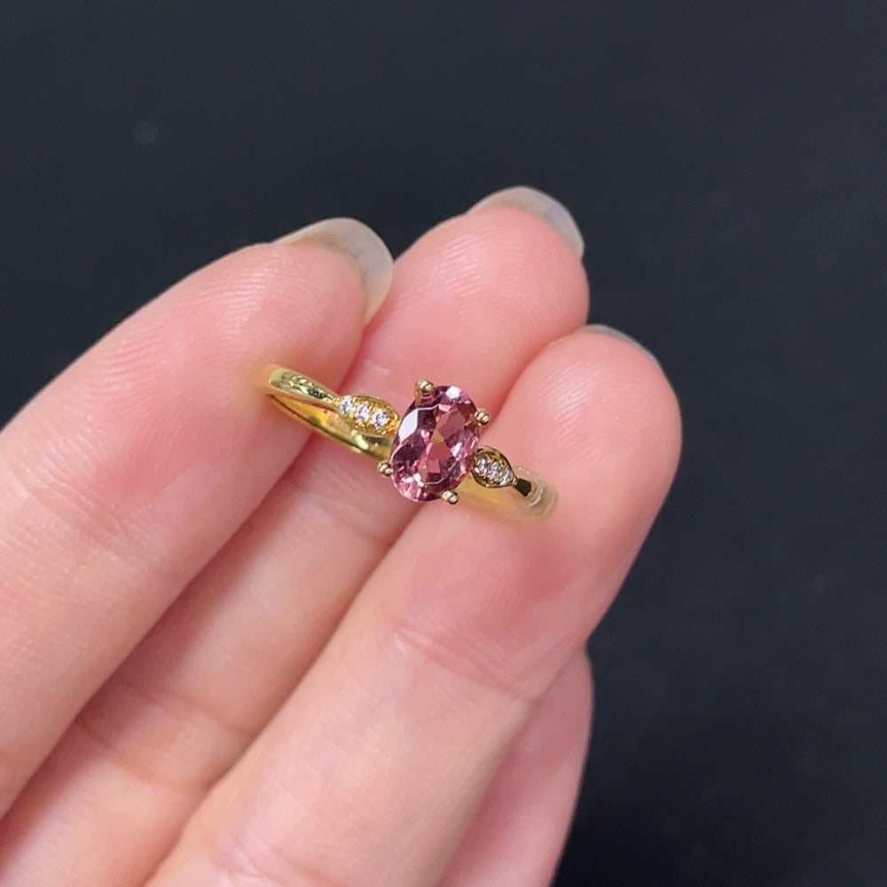 HKHQ tourmaline ring with a non-diamond design in 18K gold, featuring a vibrant green gemstone on a sleek band.