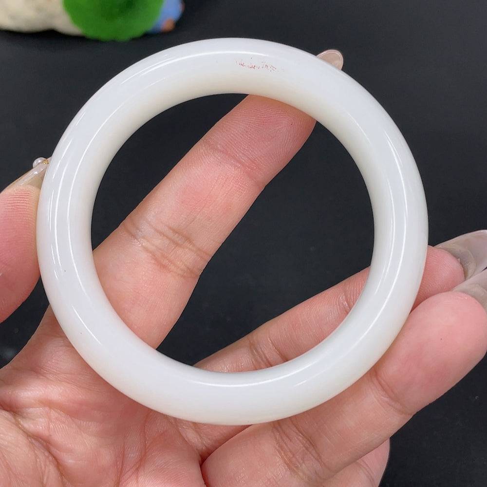 Huiliu certified Hetian jade round bracelet with smooth, polished jade beads, showcasing natural green hues and craftsmanship.