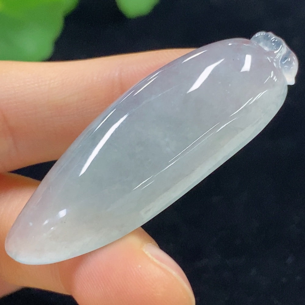 Huiliu jadeite blessing melon pendant featuring a smooth, green jade gemstone with intricate carved details.