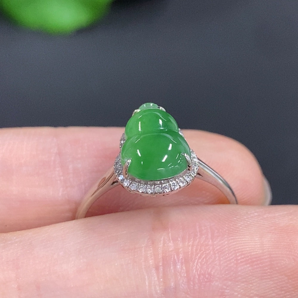 Jadeite gourd ring with 18k gold band, diamond accents, size 17, from HKHQ, showcasing intricate inlay design and precious gemstones.