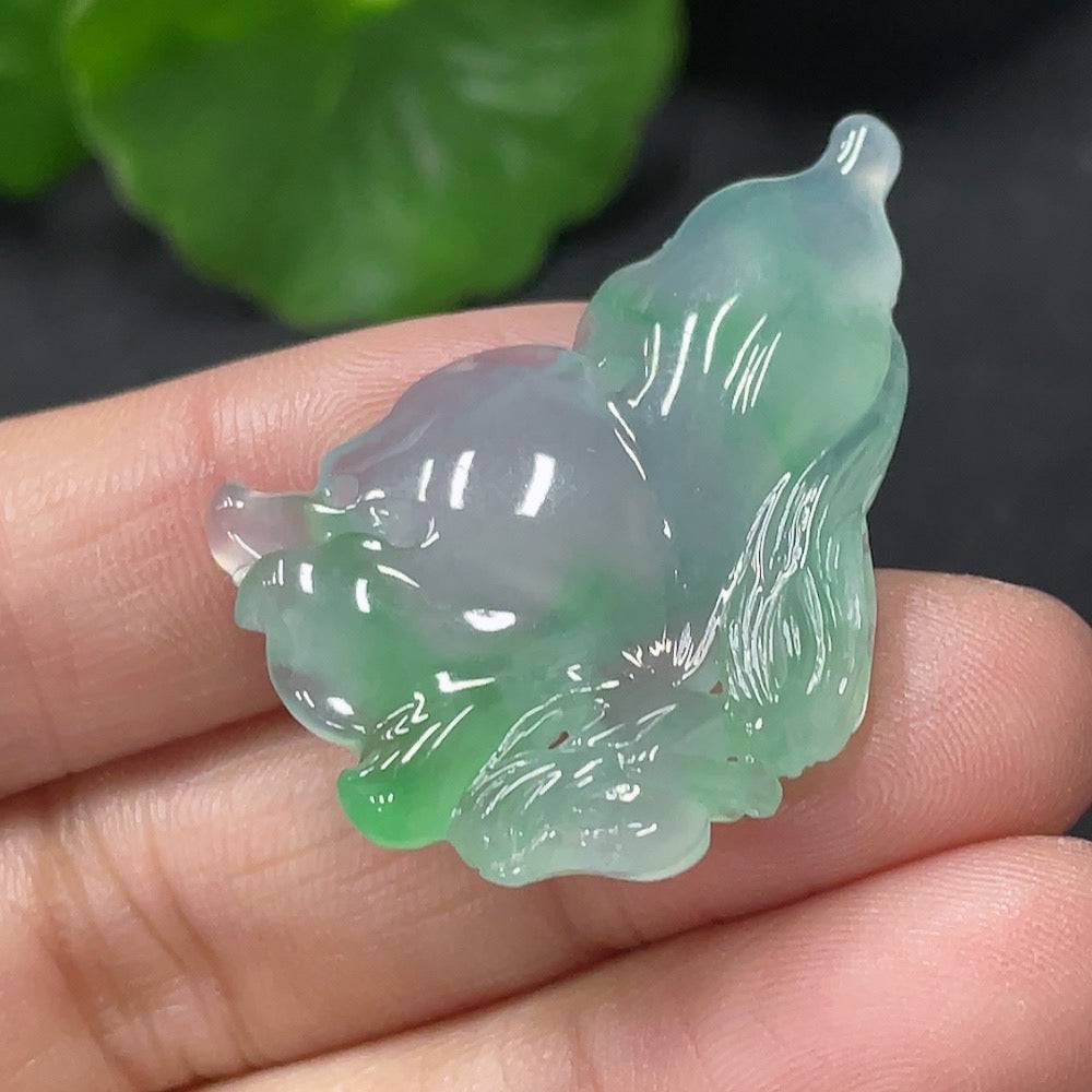 Jadeite pendant featuring a butterfly fairy design by HUILIU HQ, showcasing intricate carved jade artwork on a polished green jade pendant.