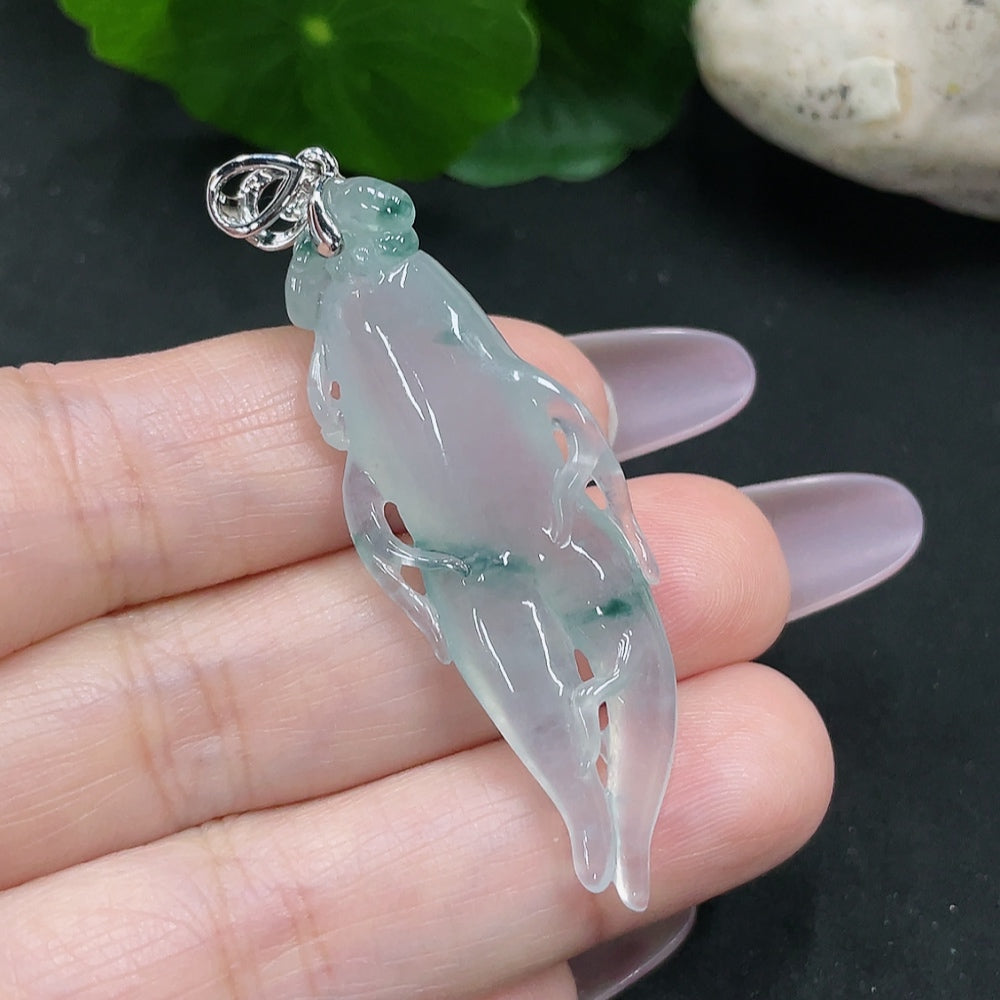 Jadeite auspicious life pendant in 18k gold with diamond inlay, weighing about 9g, featuring intricate jade craftsmanship.