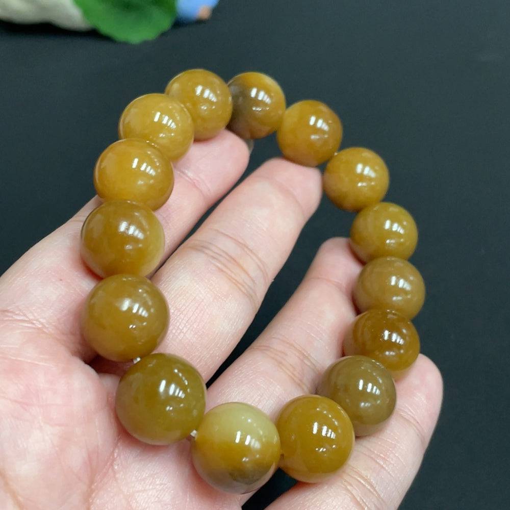 Huiliu certified Hetian Jade bracelet, 13.9mm smooth jade beads, natural green color, elegant jewelry accessory.