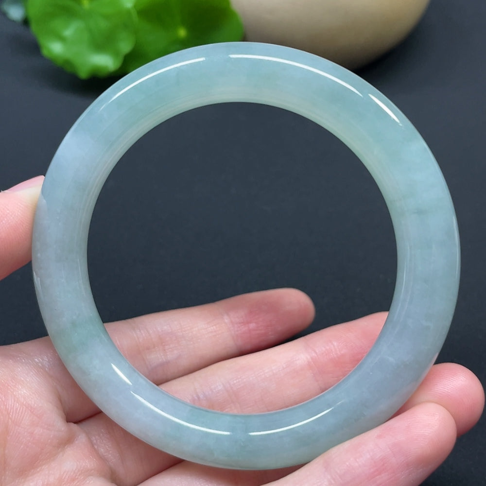 HKHQ jadeite round bangle, size 56.8, weighing 53.94g, showcasing smooth, polished jadeite bracelet with vibrant green color