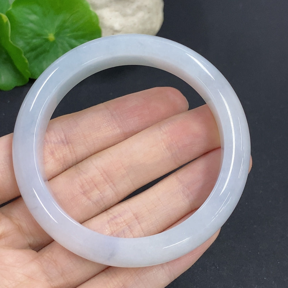 HKHQ jadeite round bangle in size 54, showcasing smooth green jadeite with a polished finish and lightweight design.