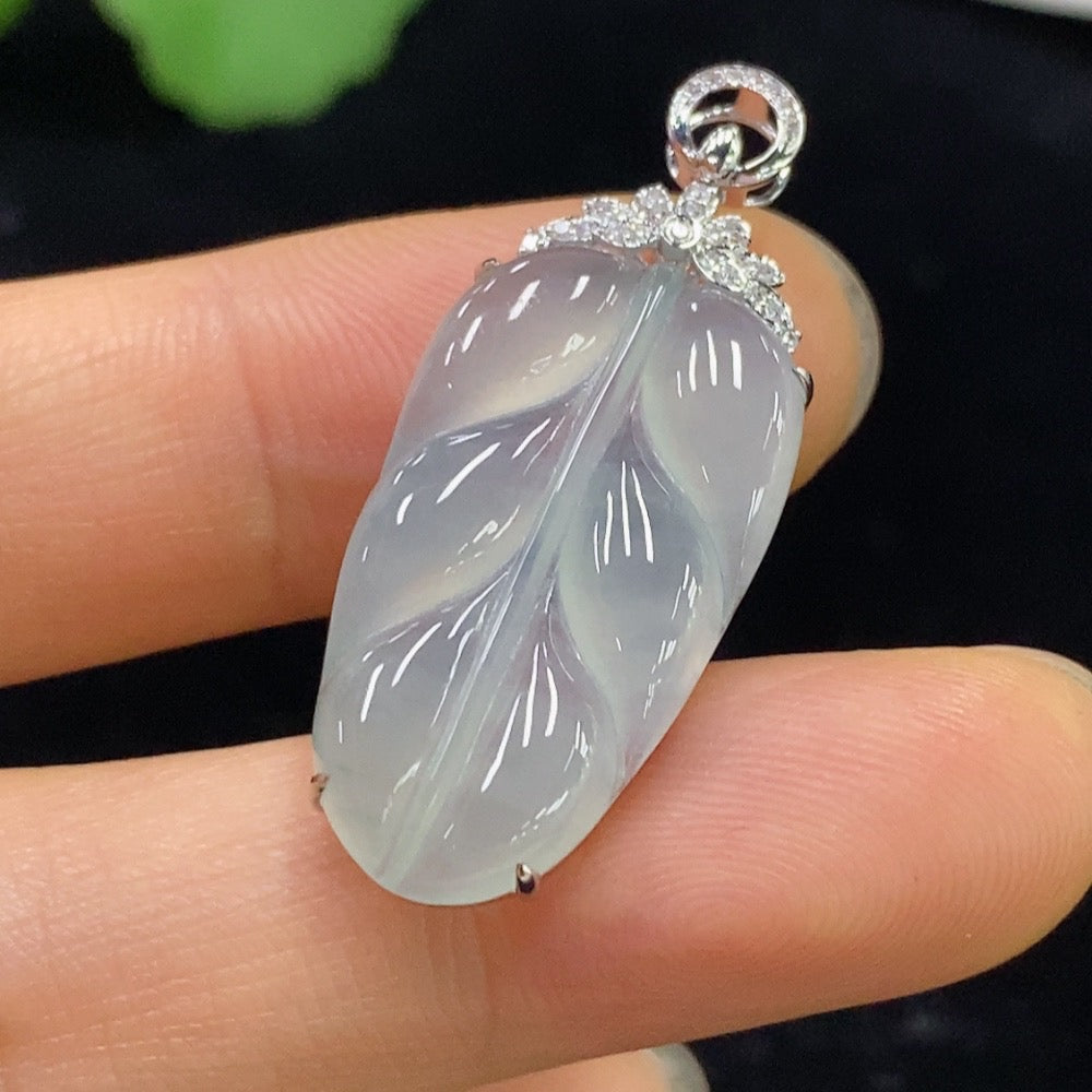 Jadeite leaf inlaid pendant by HUILIU HQ with 18k gold and diamond accents, featuring a detailed jade pendant with intricate design.
