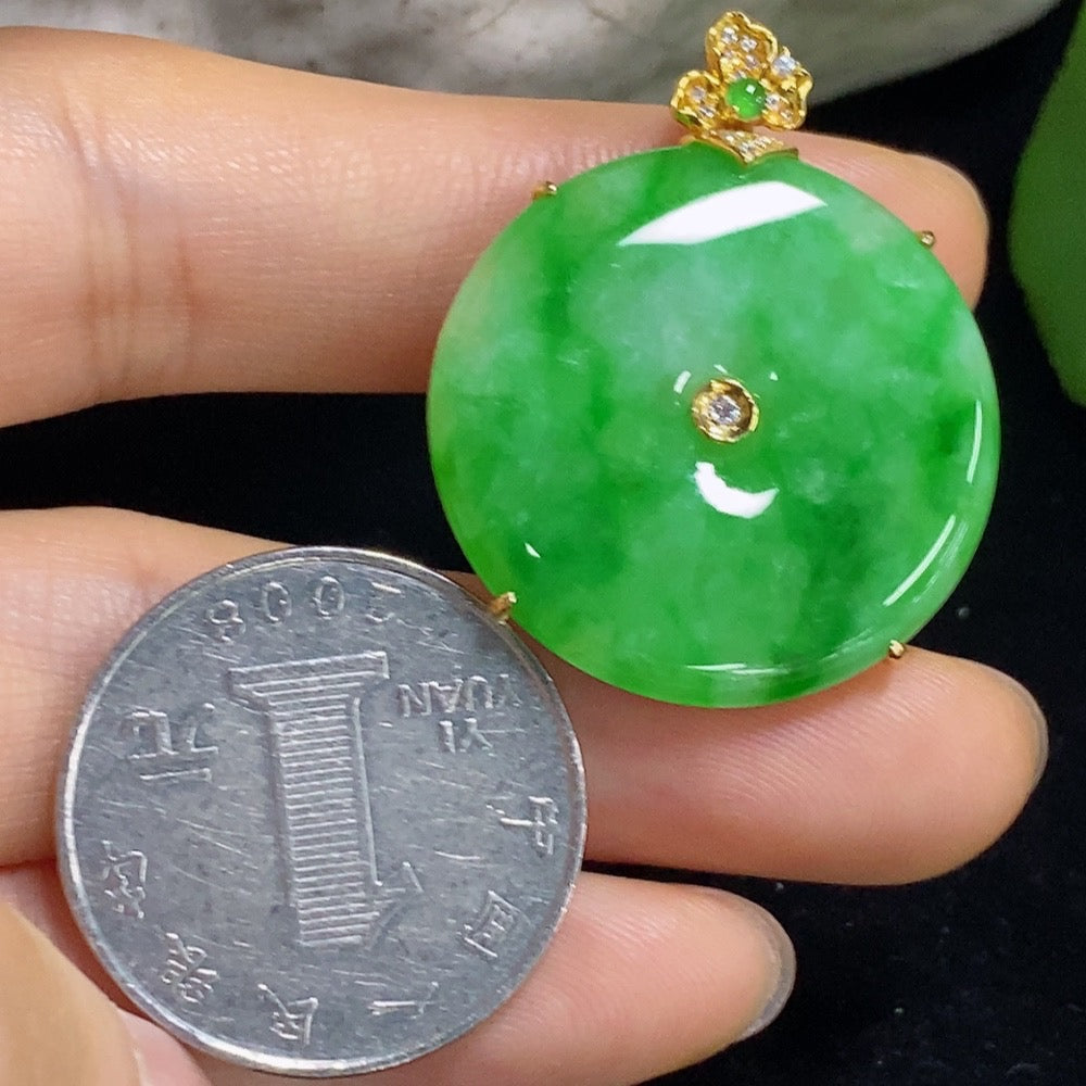 Jadeite safety buckle pendant necklace by HKHQ with 18K gold setting, featuring a smooth jadeite gemstone on a delicate chain.