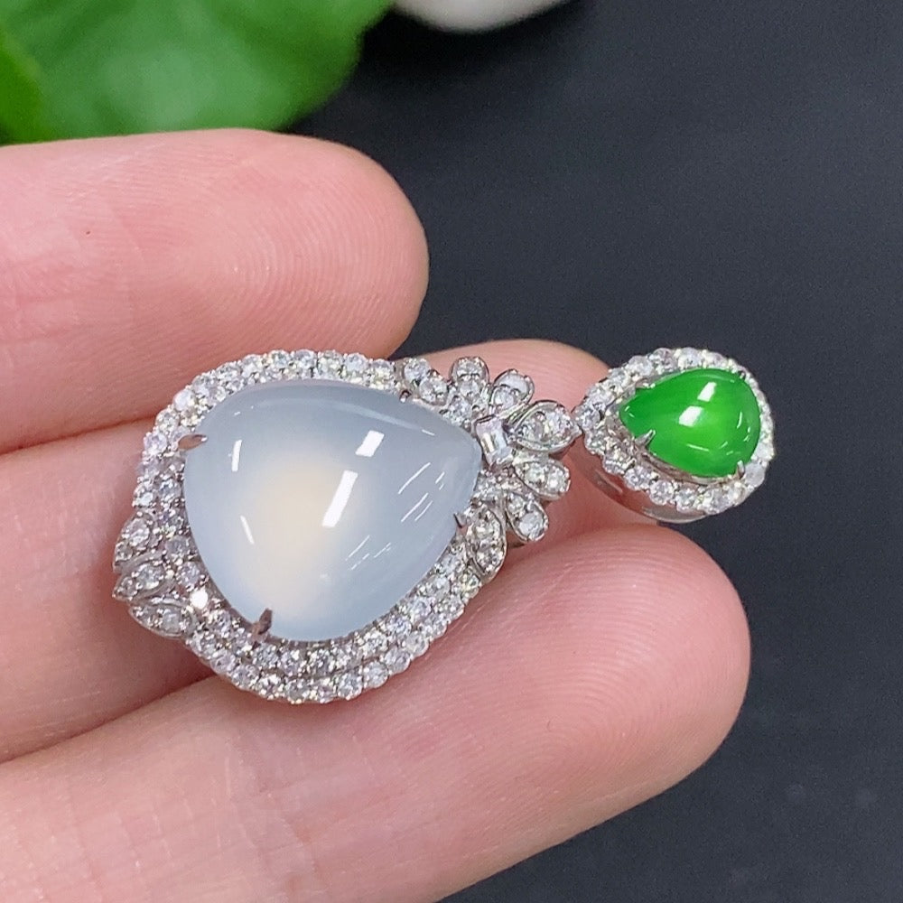 Jadeite water drop pendant necklace with 18K gold and diamond accents, featuring a smooth, polished jadeite stone.