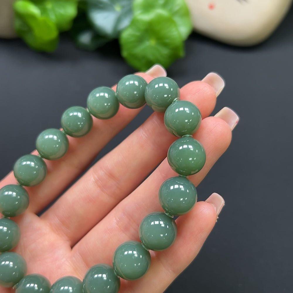 HKHQ Hetian Jade bracelet, 45g, featuring smooth, polished jade beads arranged in a stylish bracelet design.
