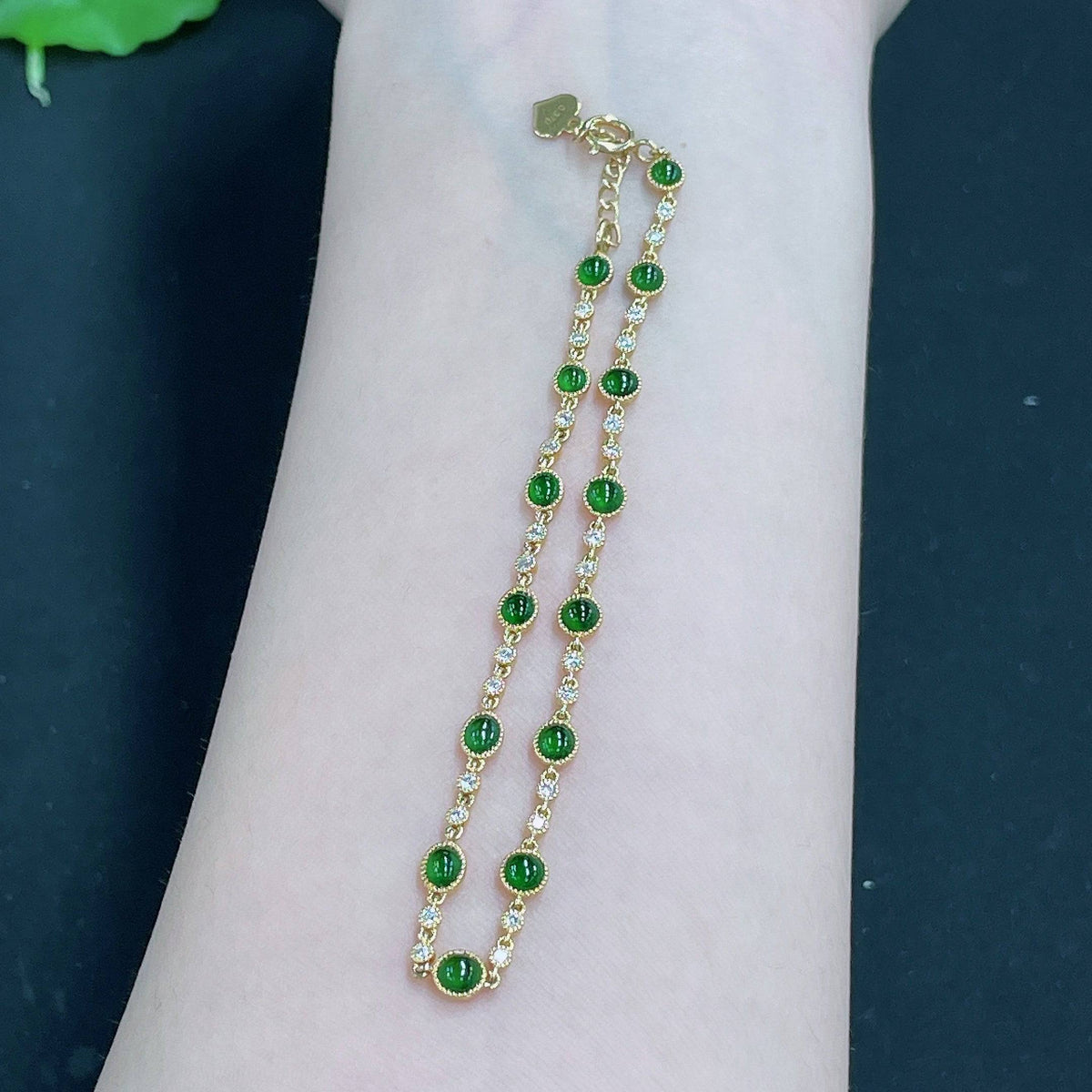 HUILIU HQ jadeite cabochon bracelet with diamond accents, 18k gold, featuring inlaid jade stones and elegant craftsmanship.