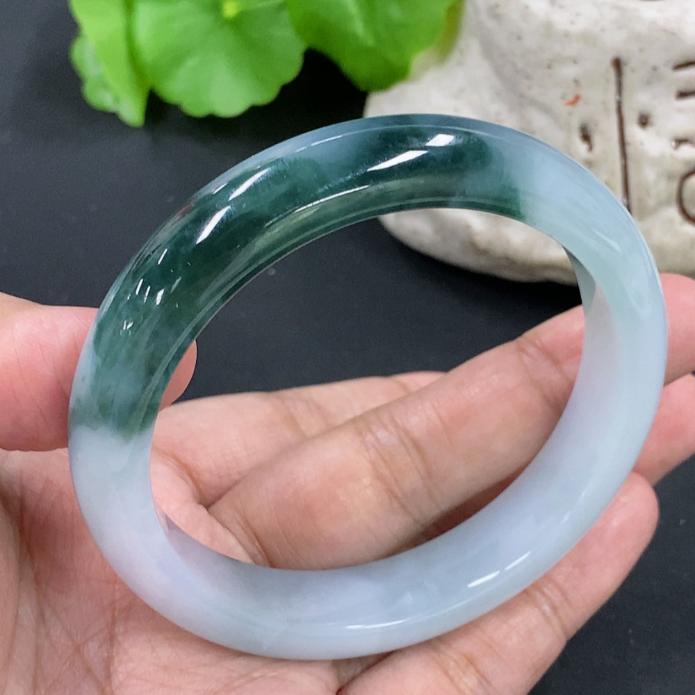HKHQ jadeite round bangle with a 55.5mm size and 51.68g weight, showcasing smooth, polished jadeite surface.
