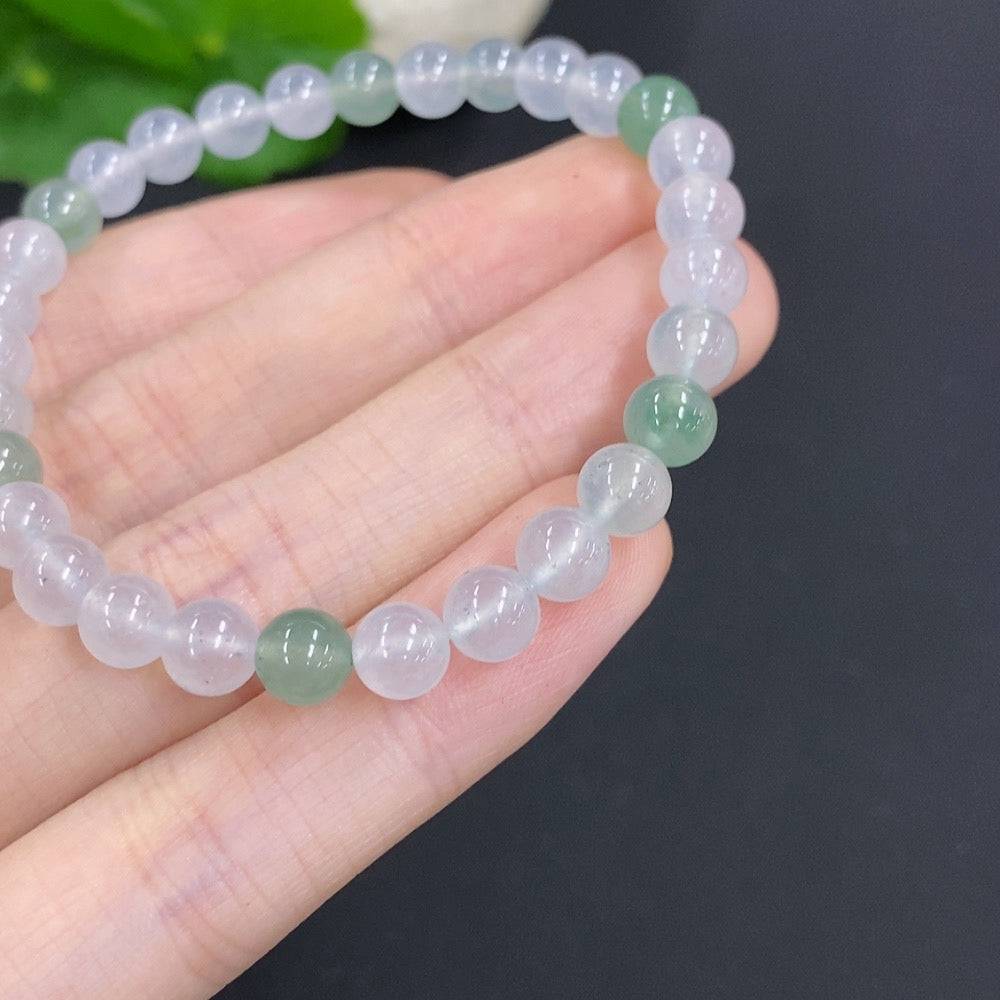 HUILIU HQ jadeite bracelet with 5.9mm beads, total weight approx. 11.4g, showcasing smooth, polished jade jewelry.