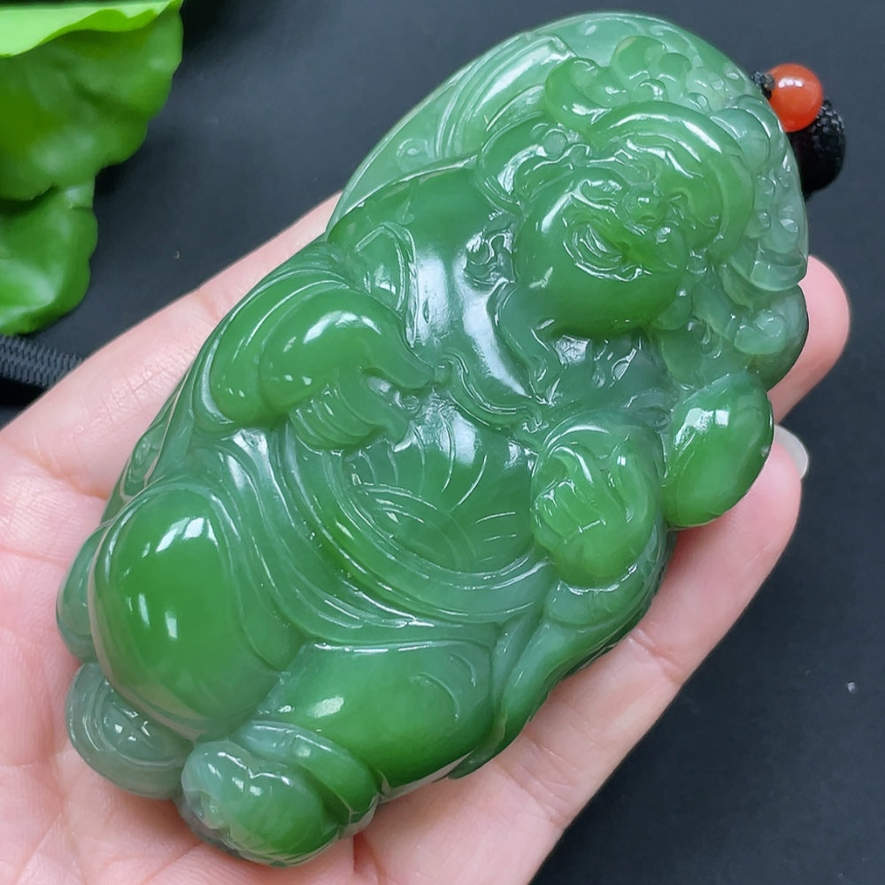 Handheld Hetian jade Buddha piece with rope, weighing approximately 190.73g, crafted by HKHQ, showcasing smooth jade details.