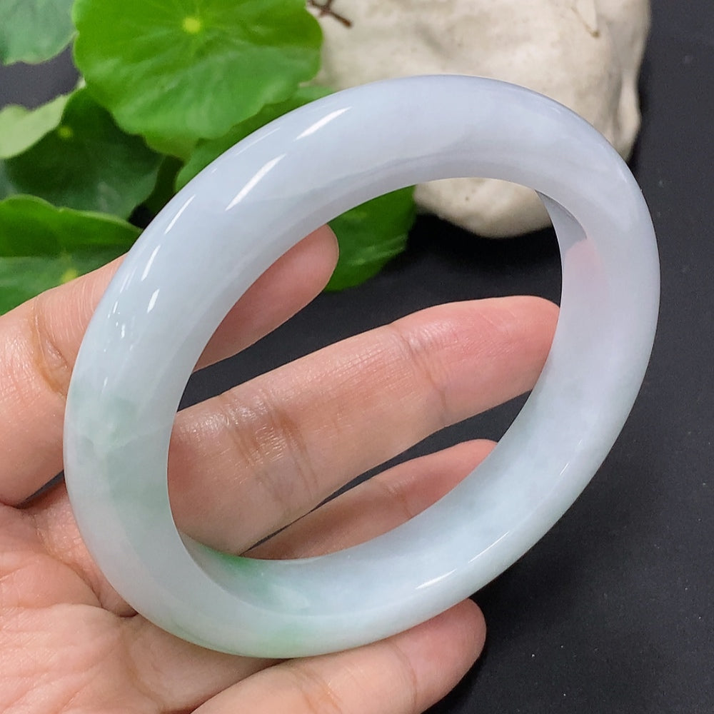 HKHQ jadeite round bangle, size 58.8, with a total weight of 68.6g, showcasing smooth, polished green jade jewelry.