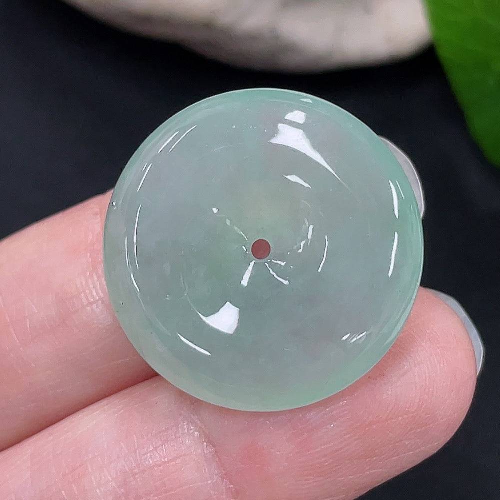 Jadeite Peace Knot pendant from HUILIU HQ, featuring a smooth, polished jade pendant with intricate knot design, weighing approximately 6.1g.