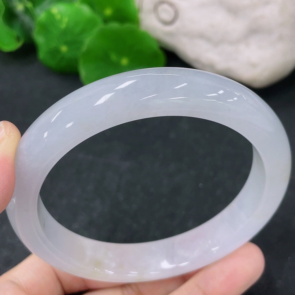 HKHQ Jadeite round bangle, size 59, polished green jade bracelet, showcases smooth, rounded design and vibrant jade color.