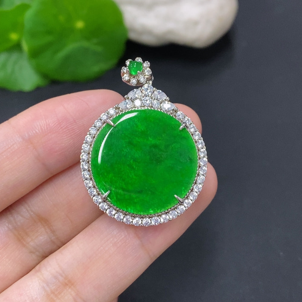 Jadeite plain pendant with a non-gold setting, displayed on a necklace chain, showcasing smooth, polished green jadeite gemstone.