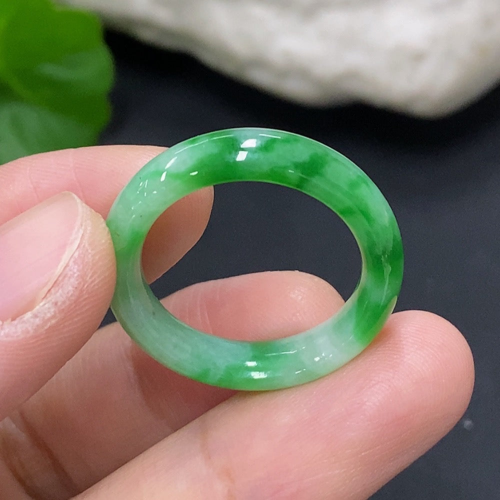 Elegant jadeite ring featuring a smooth, polished jade gemstone set in a sleek band, crafted by HKHQ.