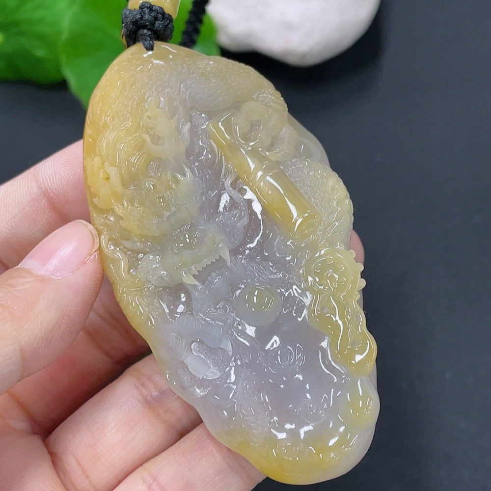 Jadeite dragon pendant with a total weight of approximately 70.5g including the cord (matching beads are non-A)