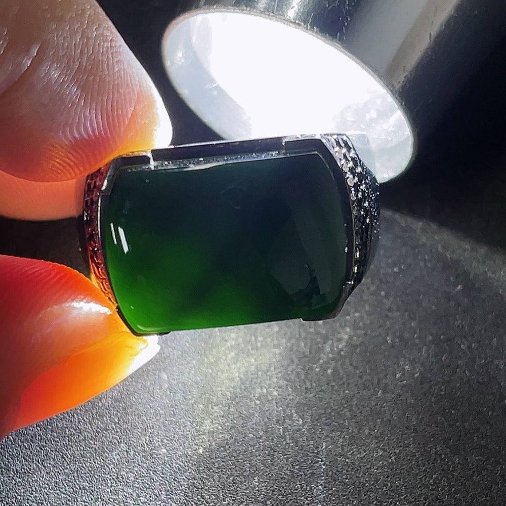 HUILIU HQ jadeite ring with diamond accents, showcasing a polished green jade gemstone and sparkling diamond details.