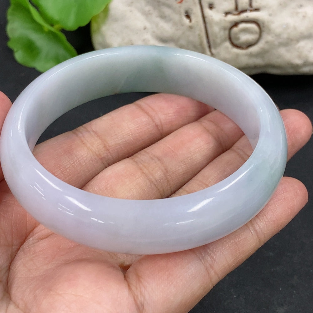 Jadeite round bracelet with 64.3g weight and size 59.4, crafted by HKHQ, featuring smooth jadeite beads on a flexible string.