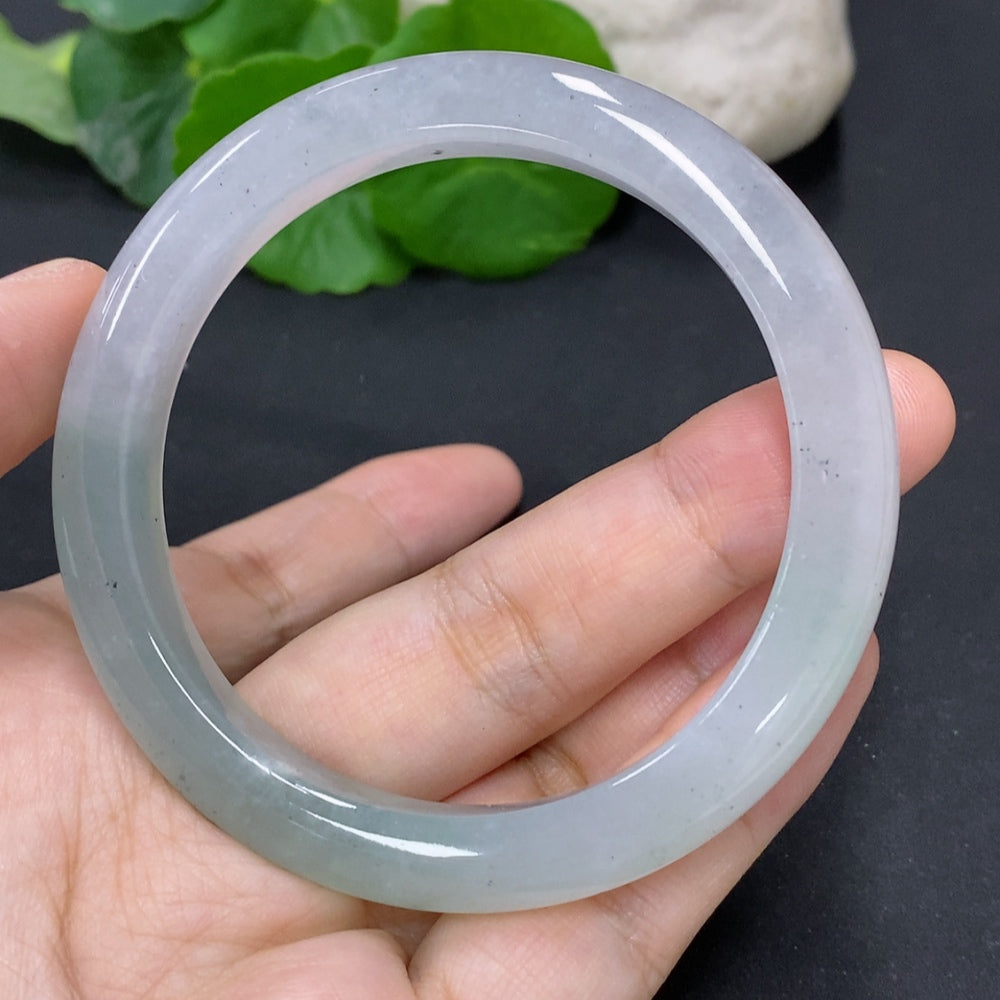 HKHQ jadeite round bangle in size 56.7 with a total weight of 44g, showcasing smooth, polished green jade jewelry.
