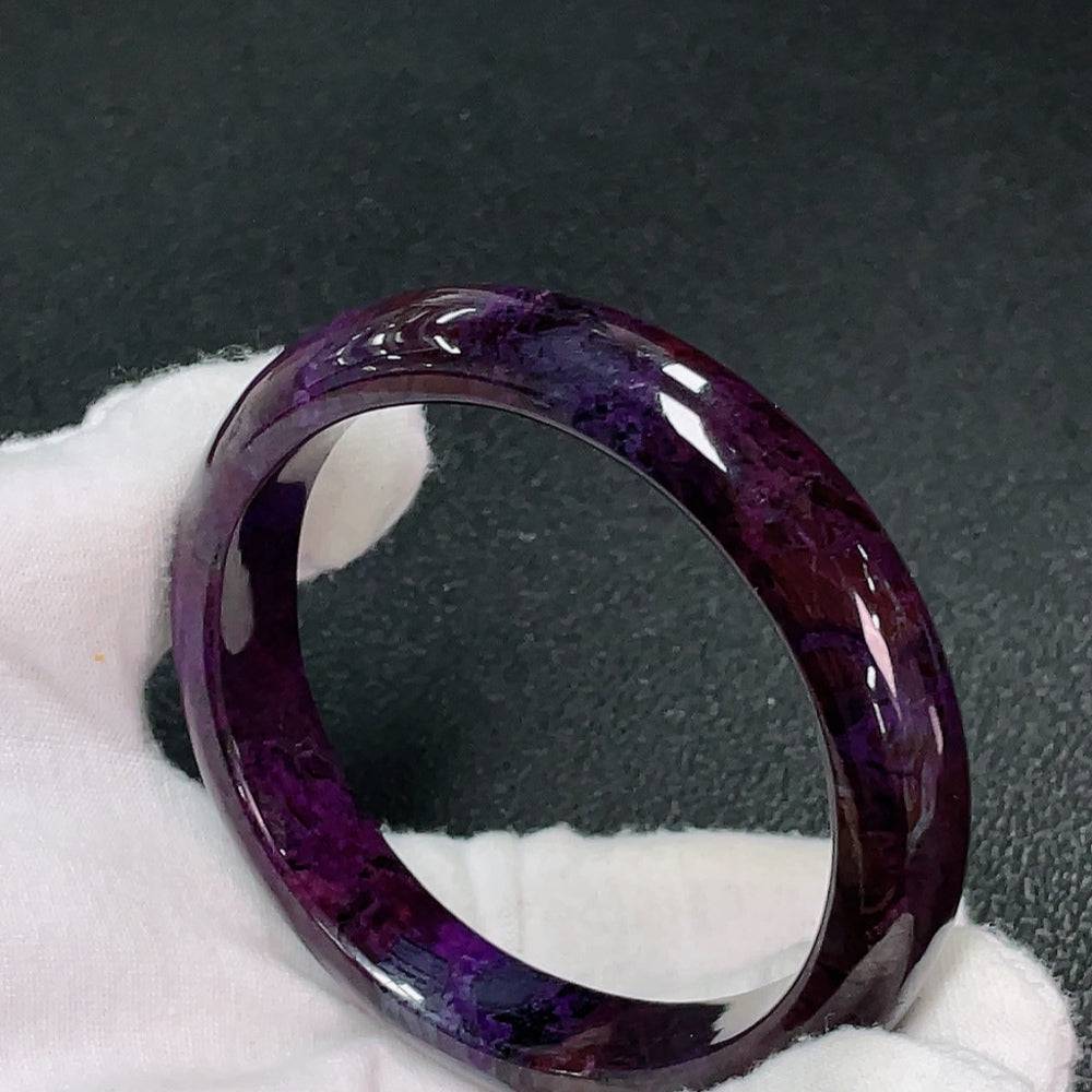 Sugilite gemstone bracelet with purple stones and mineral components, approximately 57.8mm in size, from HUILIU HQ.