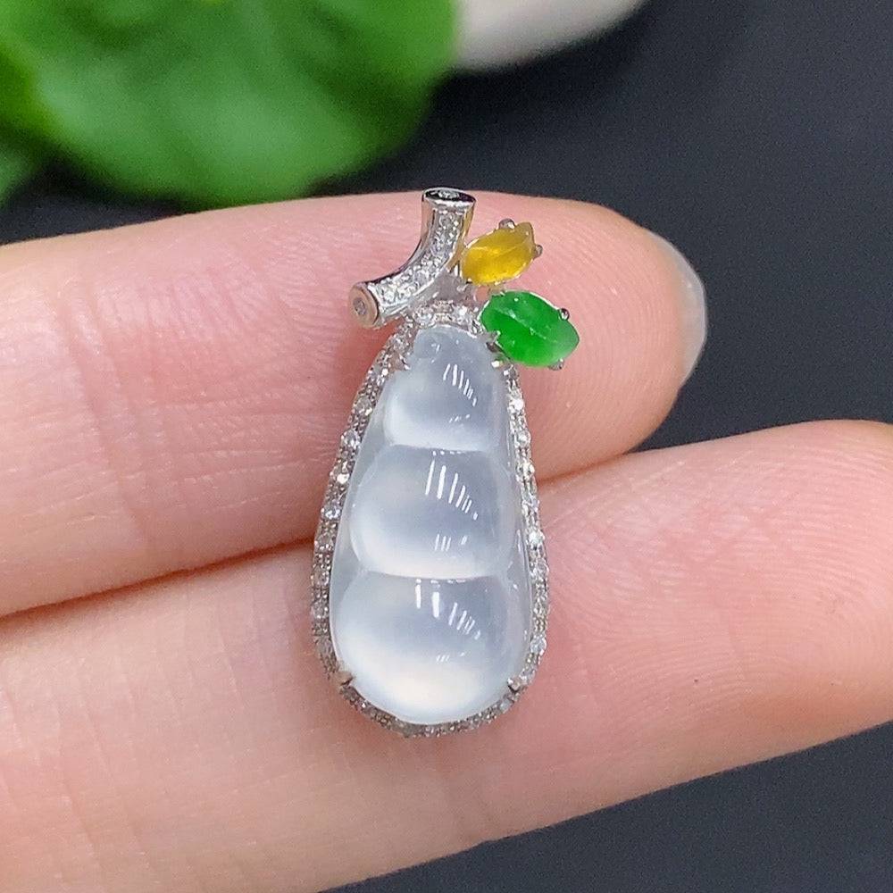 Jadeite gourd pendant with 18K gold and diamond accents, showcasing smooth green jade carved in a gourd shape.