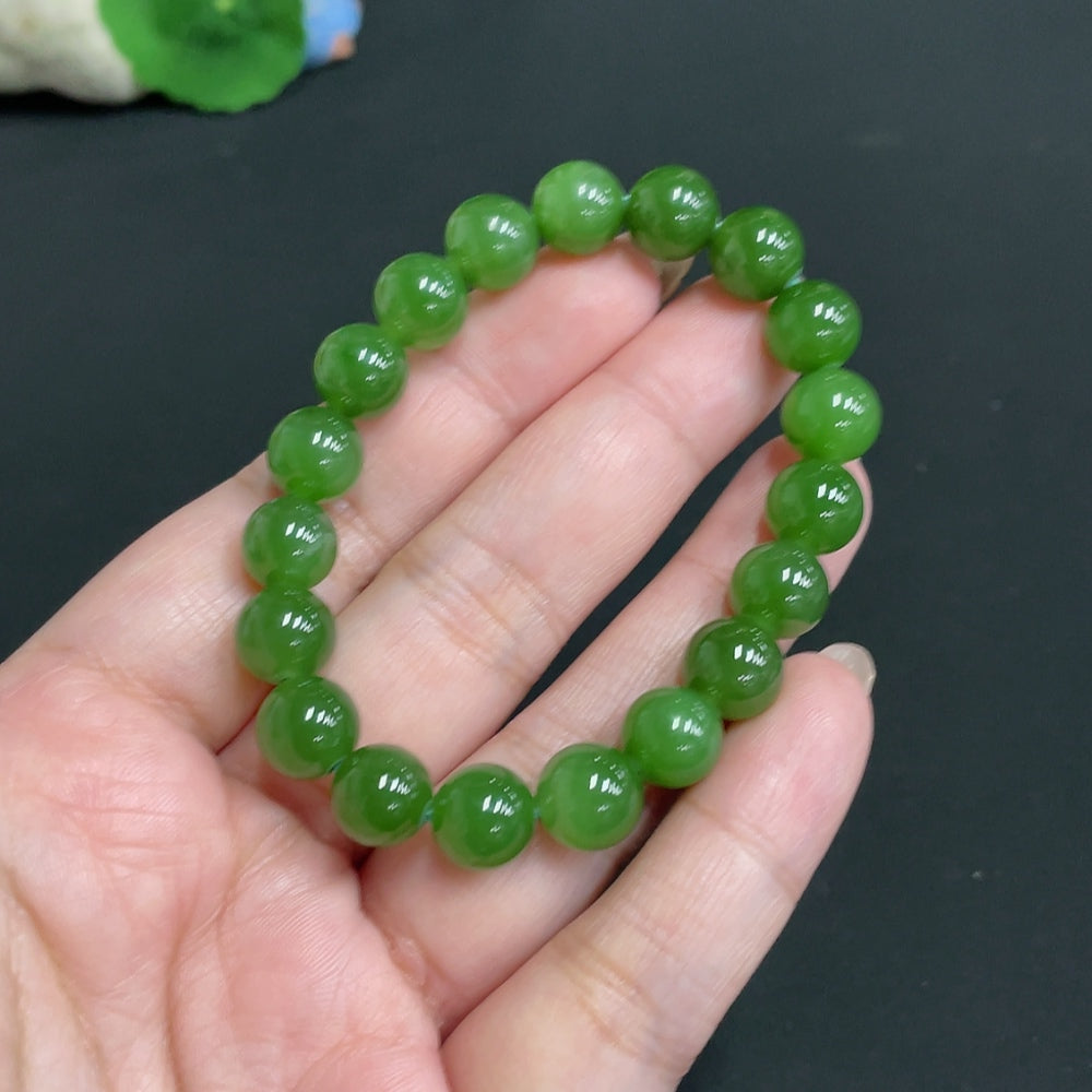 Hetian jade jasper bracelet with 9.3mm beads and 24.1g weight, showcasing smooth, polished natural jade stones.