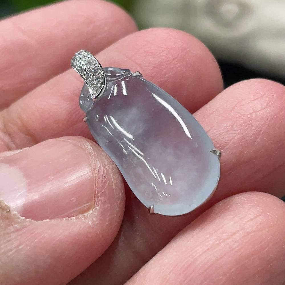 Jadeite auspicious gourd pendant with 18K gold setting and diamond accents, crafted by HUILIU HQ, weighing approximately 2.19g.
