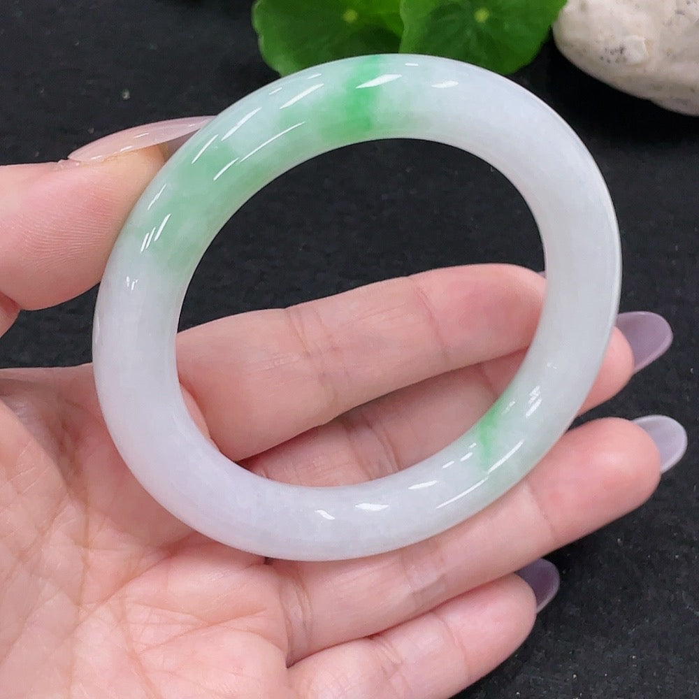 HUILIU HQ jadeite round bangle, size 54, weighing approximately 57.4g, showcasing smooth, polished jadeite surface.