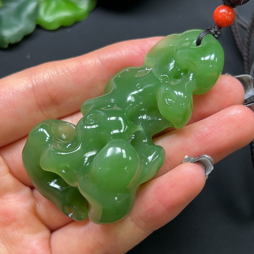 HKHQ Hetian Jade and coral stone pendant necklace with rope, weighing approximately 48.17g, featuring natural jewelry design.