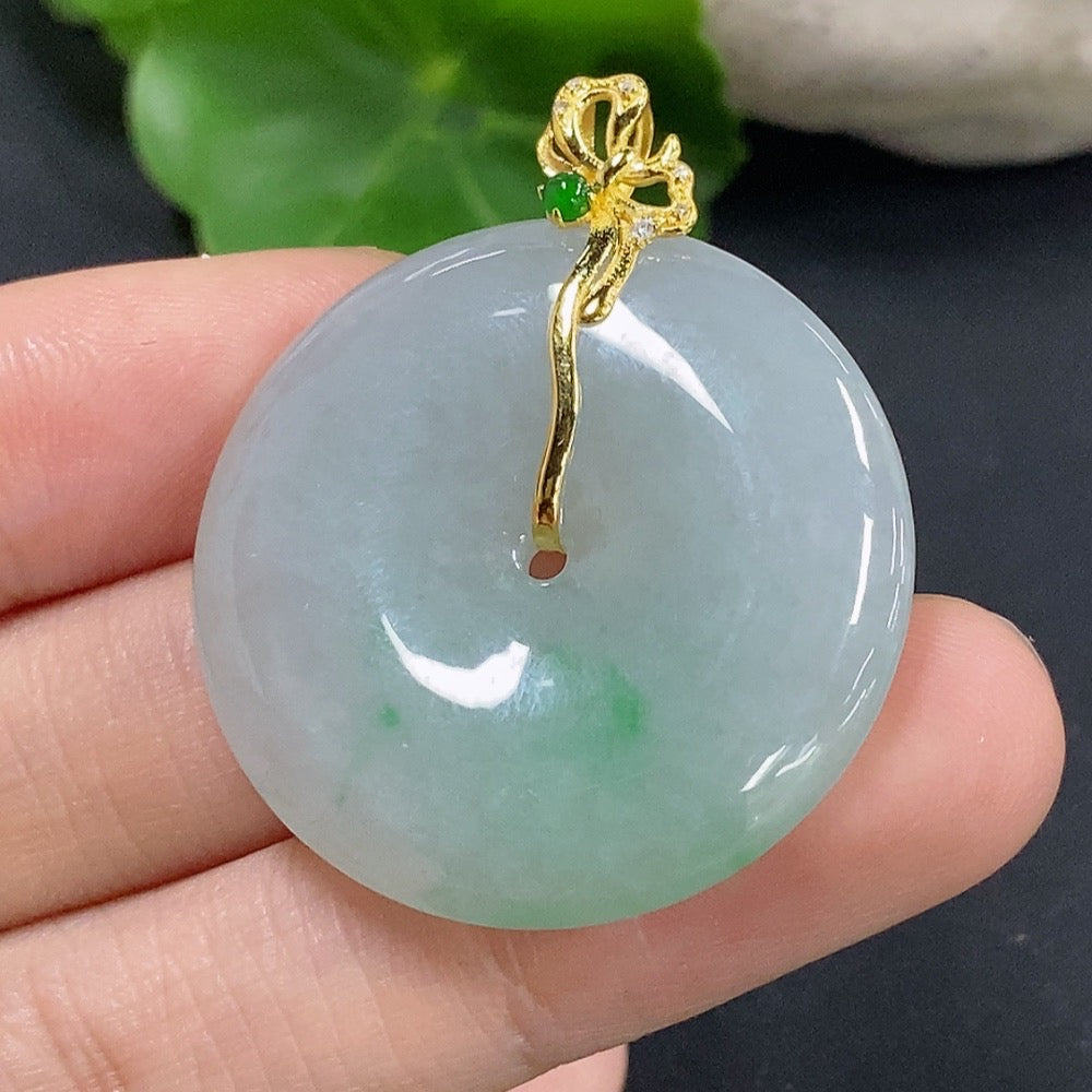 Jadeite Peace Button pendant with diamond accents, 18K gold setting, crafted by HKHQ, showing the detailed jade design and gold finish.