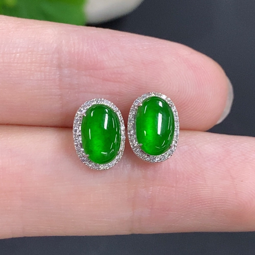 HKHQ jadeite cabochon stud earrings in 18k gold with diamond accents, showcasing polished green jade stones and delicate gold settings.