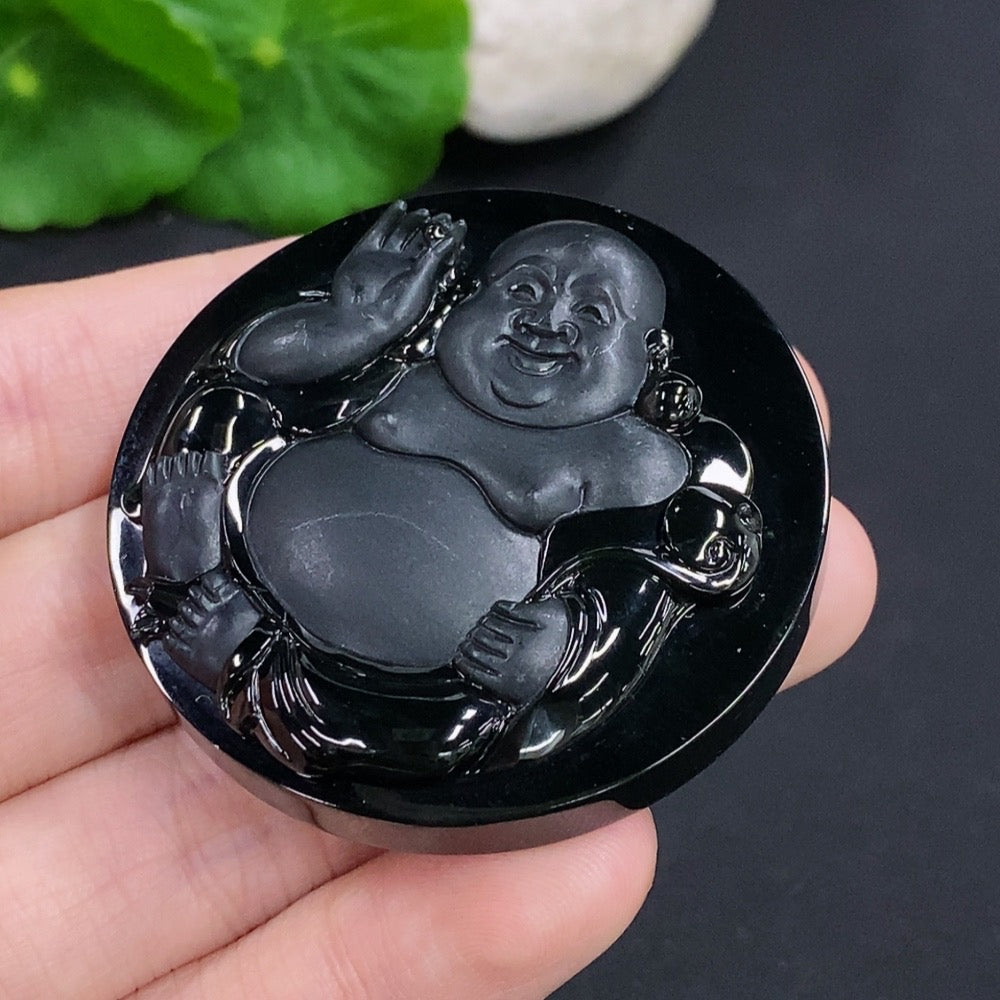 Jadeite Buddha pendant from HKHQ, crafted of green jade, weighs approximately 44.6 grams, featuring detailed Buddha carving.