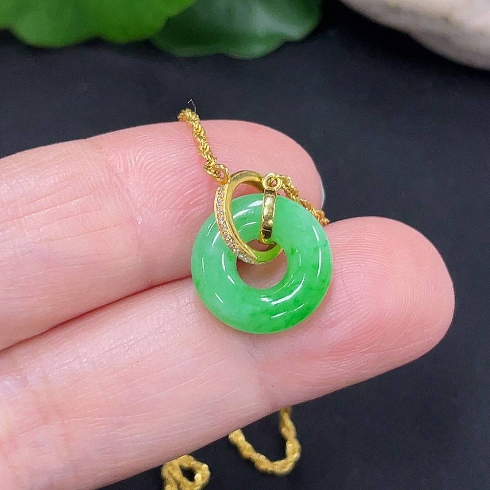 Jadeite inlaid necklace with 18K gold chain by HUILIU HQ, showcasing a delicate jade pendant on a fine gold chain.