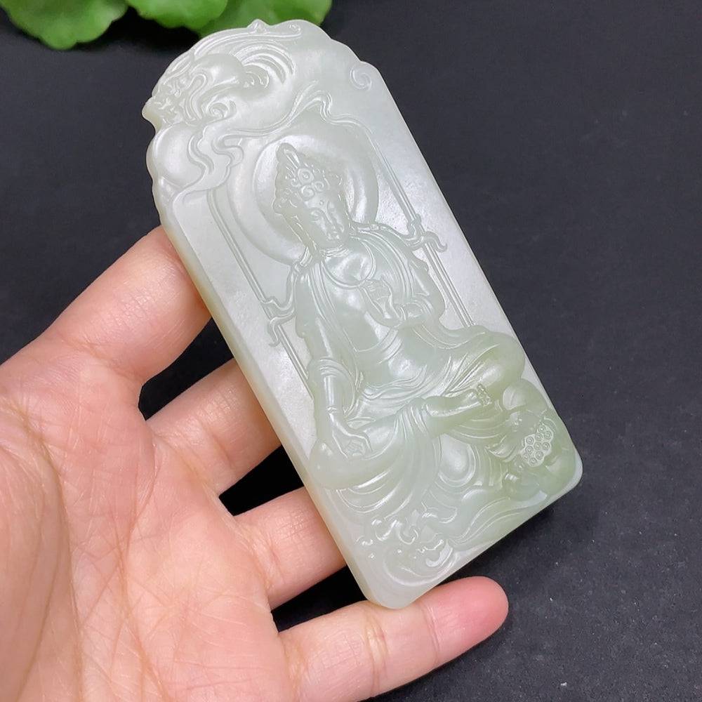 Huiliu certified Hetian jade pendant featuring Guanyin figure, intricately carved with smooth, polished surface and traditional design.