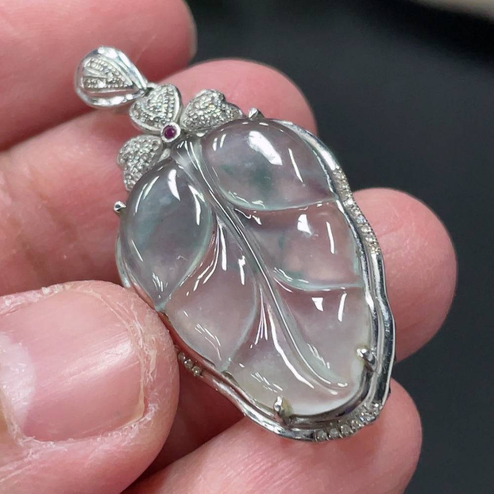 Jadeite leaf inlay pendant with 18K gold and diamond accents, crafted by HUILIU HQ, featuring a natural green jade leaf design.
