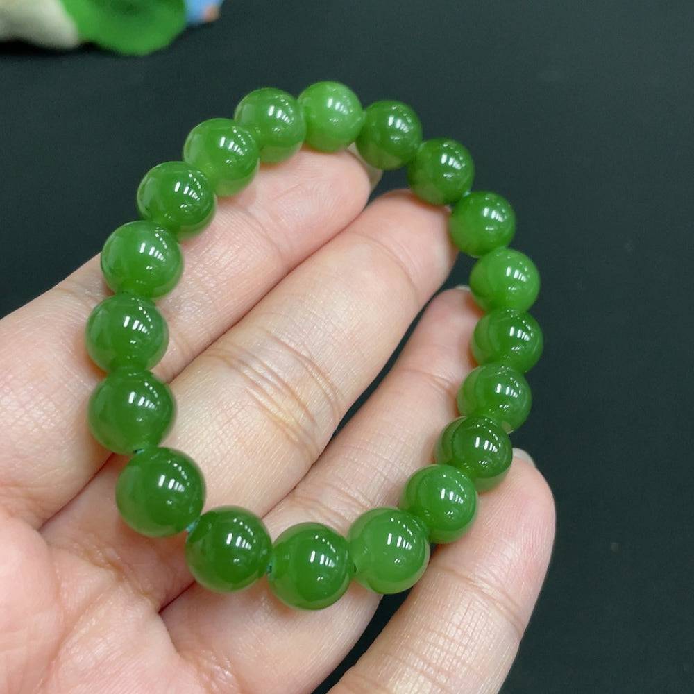 Hetian Jade Jasper bracelet with 9.3mm beads and 24.1g weight, featuring polished jade stones from HUILIU HQ.