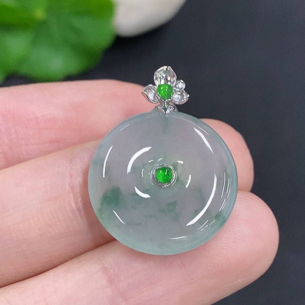 Jadeite peace knot pendant with 18K gold clasp, crafted by HUILIU HQ, featuring smooth green jade with intricate knot design.